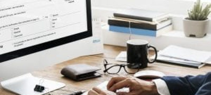 viewing medical invoice on computer for medical billing outsourcing purposes